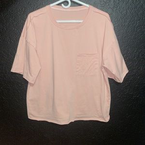 pink cropped tee w pocket! never worn! no tag so do not know the brand